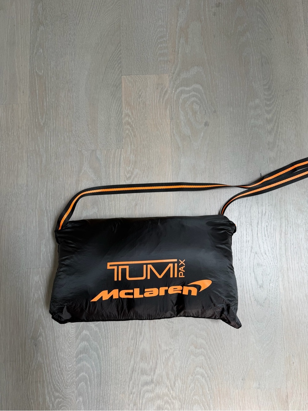 TumiPAX McLaren Packable Black Puffer Vest/Pillow with Orange Trim - Picture 12 of 12